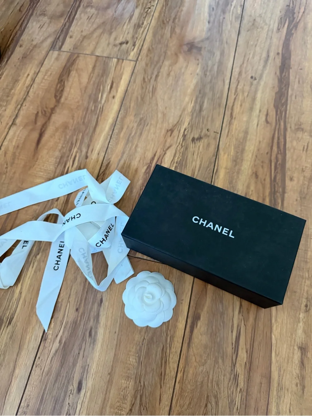 CHANEL Black Box with White Ribbon and Camellia